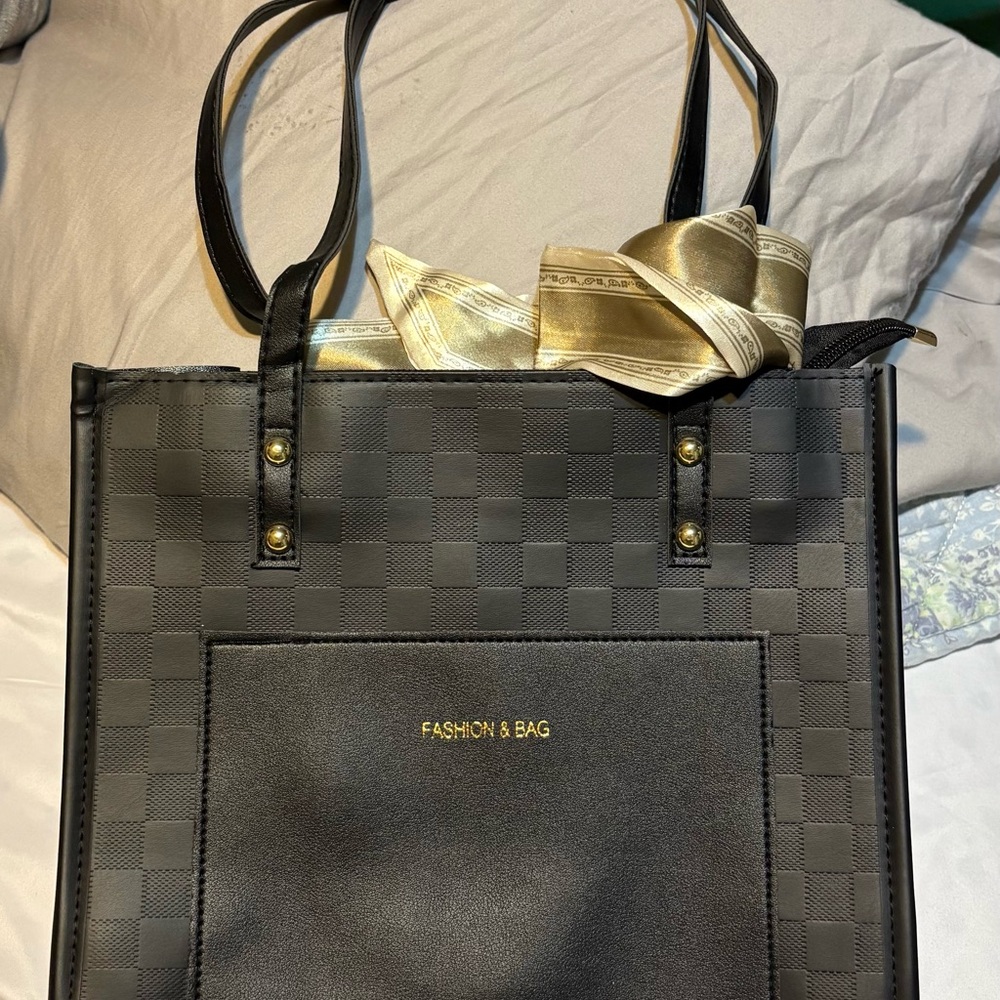 Chic Black and Gold Tote Bag with Luxurious Design